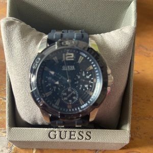 Guess sport watch, water resistant. Silicon /rubber band. New with box and tag